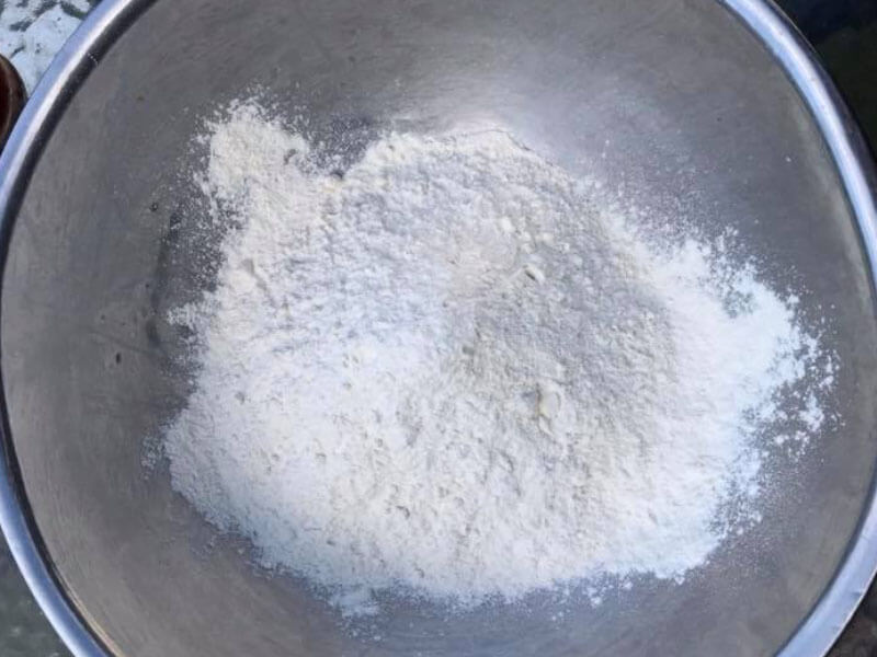 combine flour, salt and water into a bowl for the camp oven recipe